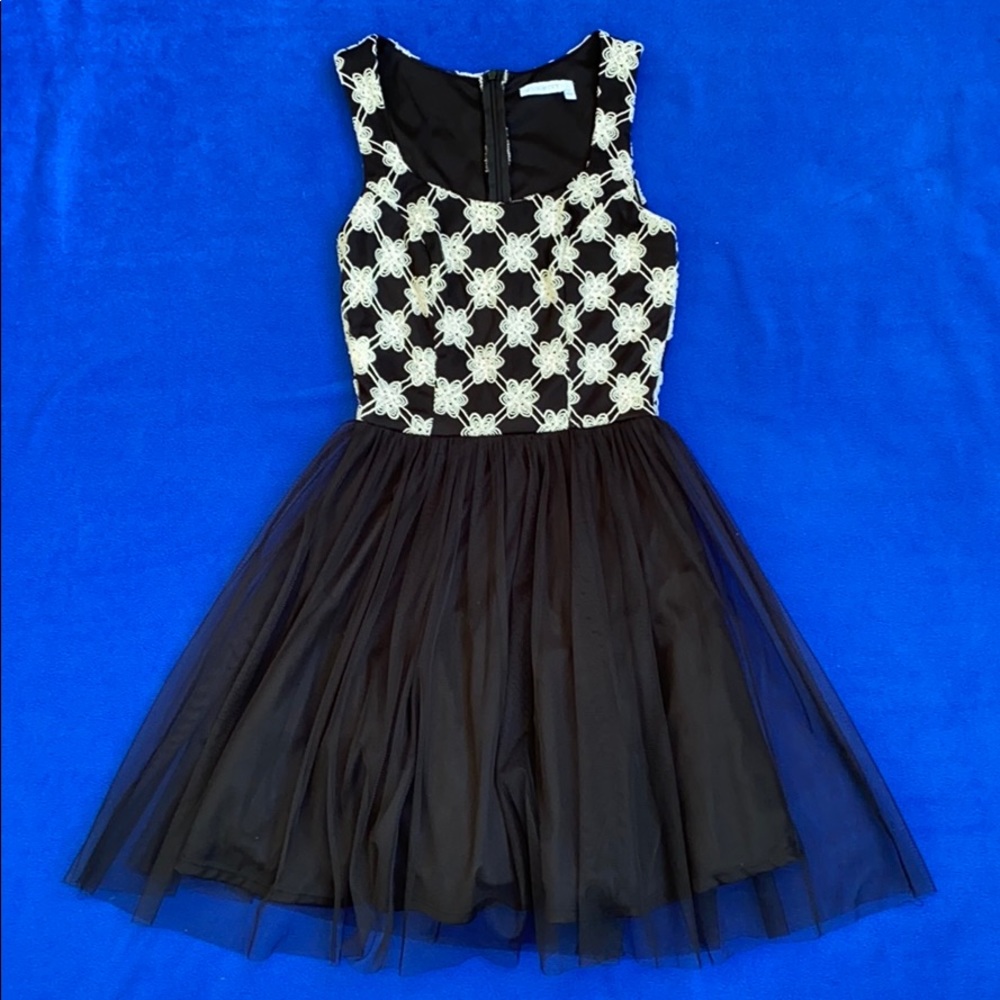 Black dress with tulle and embroidered flowers